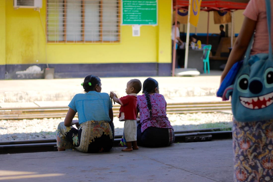 Two local women relaxing at the Yangon Central Station